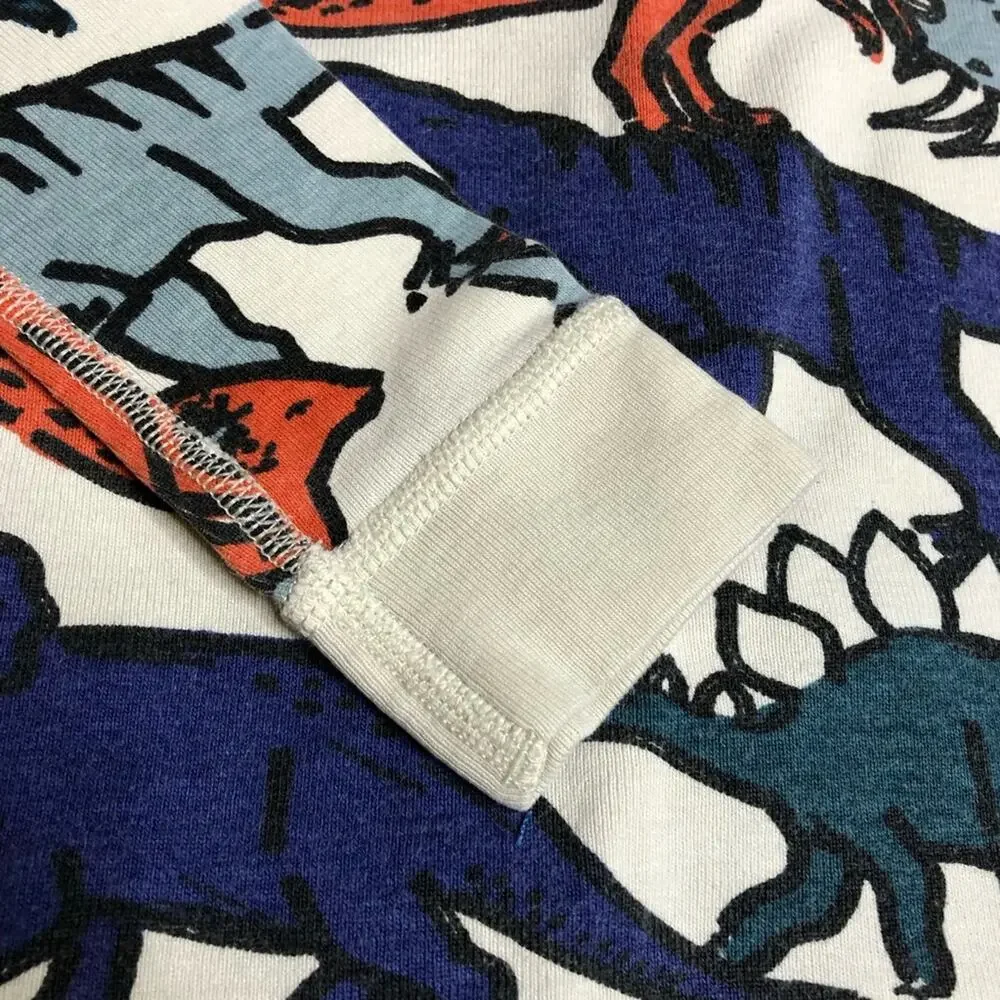 Hanna Andersson off white multicolor dinosaur pajamas size 140 or US 10